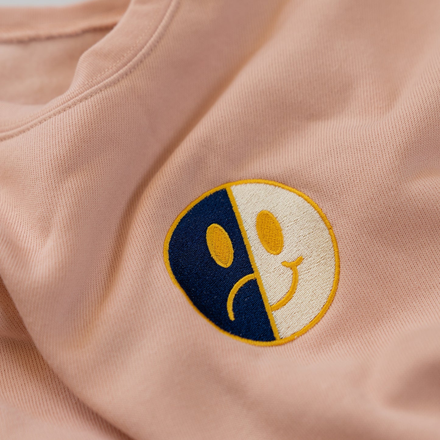 Happy/Sad Peach Sweatshirt